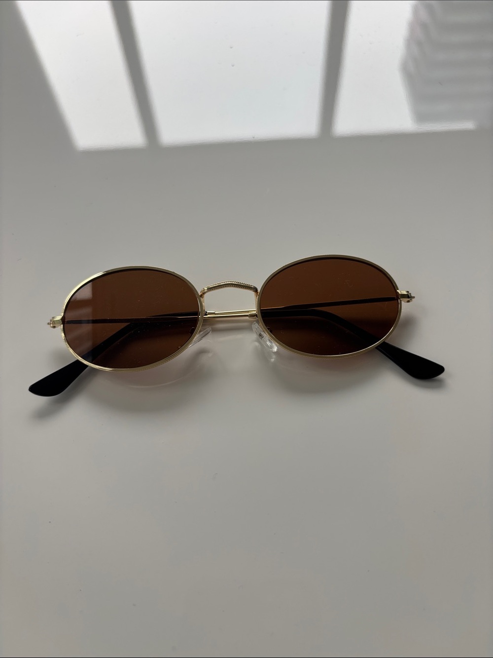 Gold Frame Oval Sunglasses with Brown Lenses